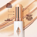 Charlotte Tilbury - Iluminador - Unreal Skin Sheer Glow Tint Hydrating Foundation Stick