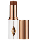 Charlotte Tilbury - Iluminador - Unreal Skin Sheer Glow Tint Hydrating Foundation Stick